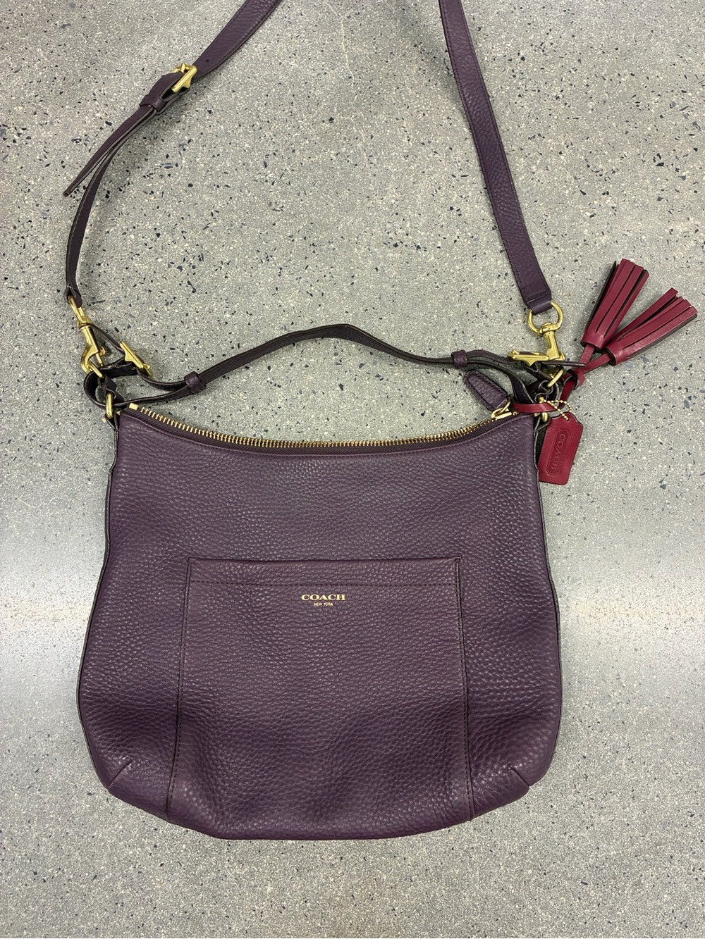 Coach Pebbled Leather Shoulder Bag in Plum with Red Tassel